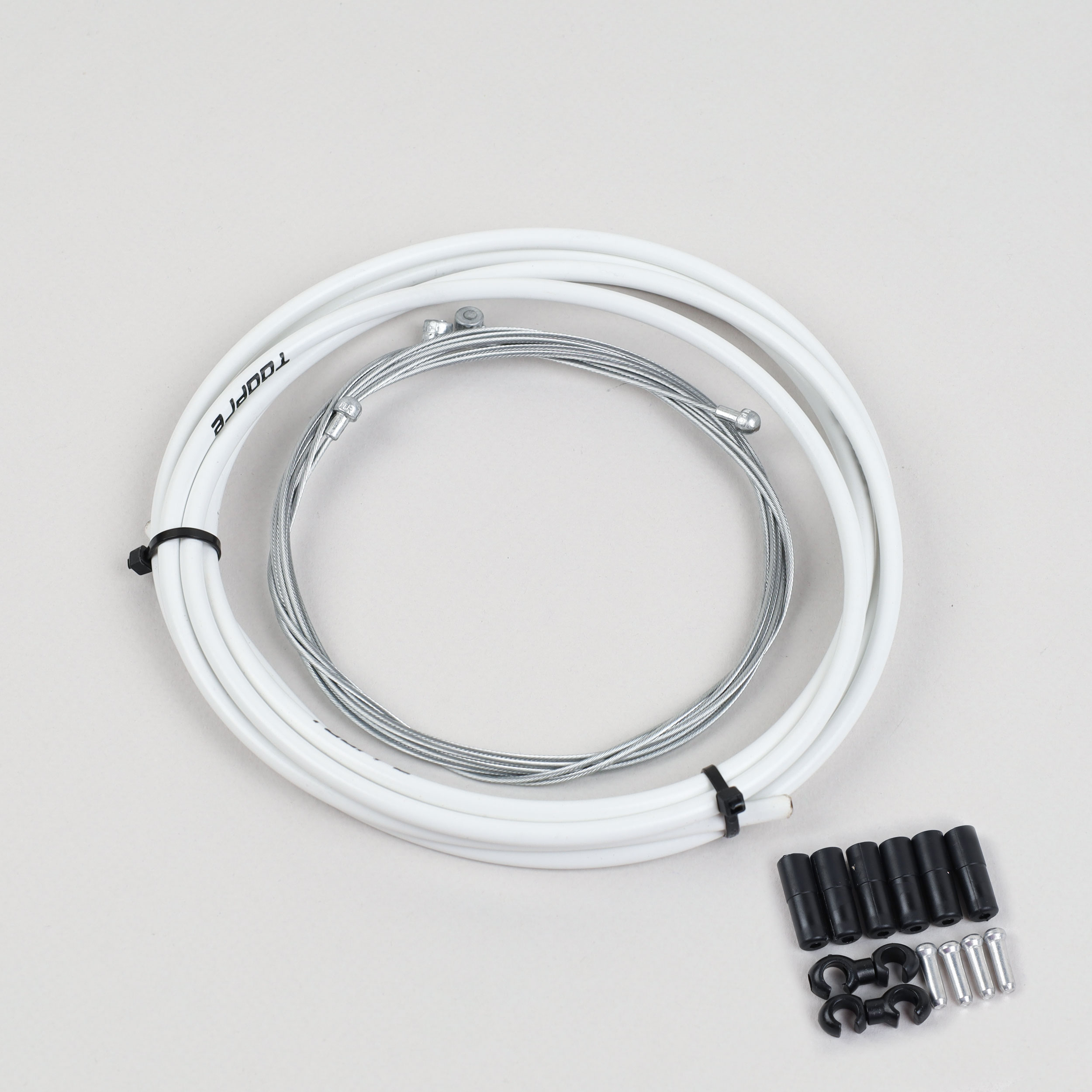 Комплект оплетки и тросов велосипеда на тормоза. 1 Оплетка/2 троса/наконечники/зажимы. TOOPRE SCS-002. белый /уп 100/