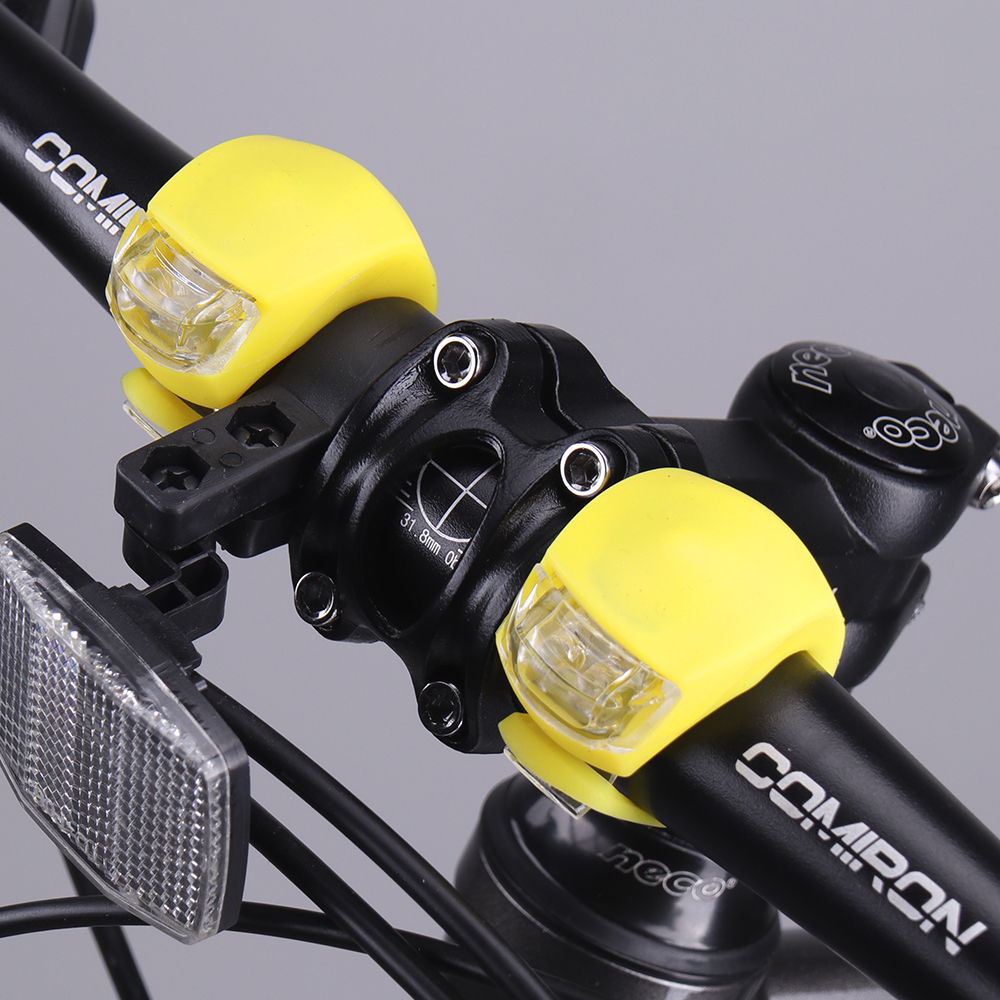 Фонарь LED в силиконовом корпусе на руль велосипеда скутера на шлем питание от батареек желтый набор из 2 штук в блистере /689376/    