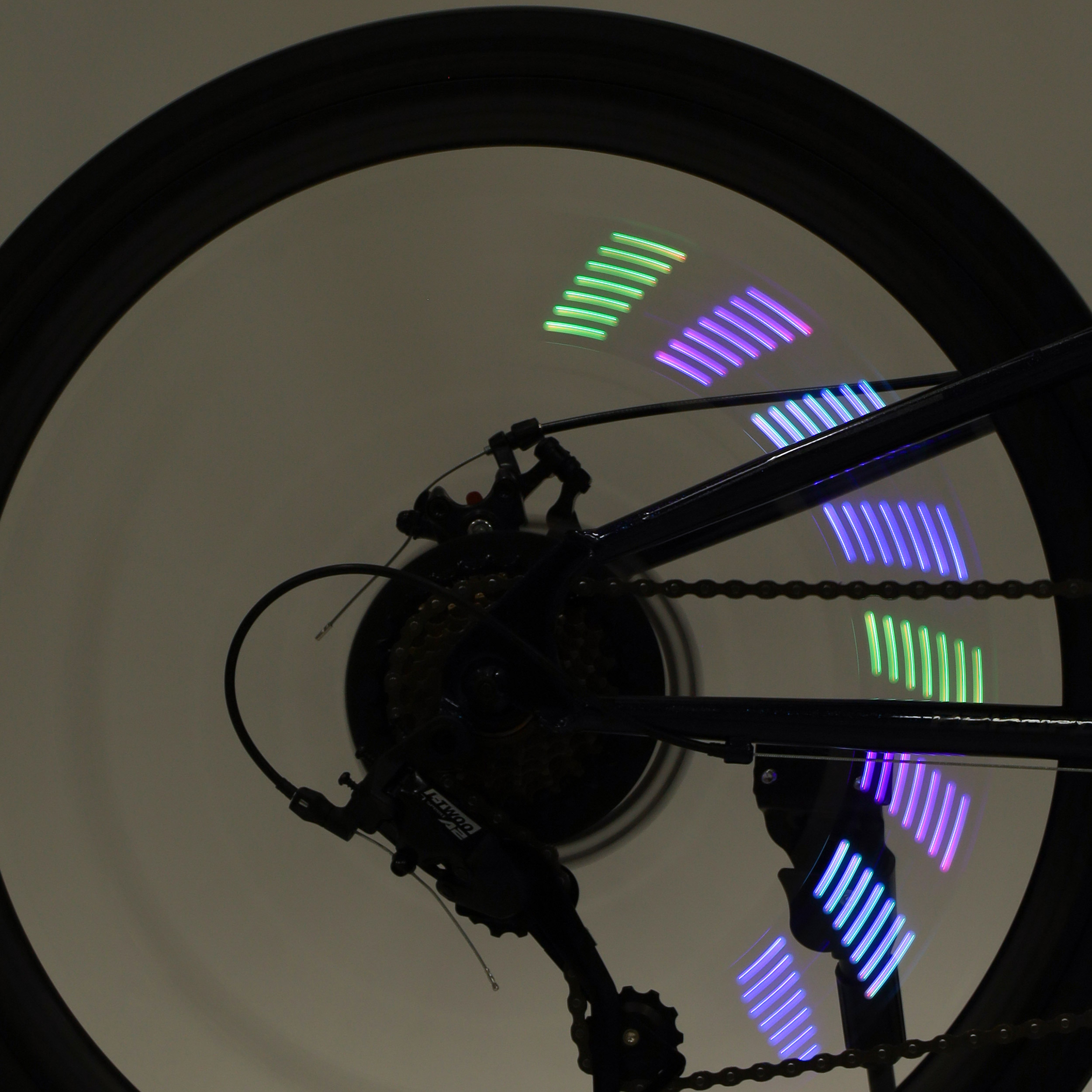 Фонарь подсветка для колес COMIRON "A02" корпус: пластик; свет 14 RGB LED; аккум USB; влагозащита IPX5; 30 рисунков. /уп 100/