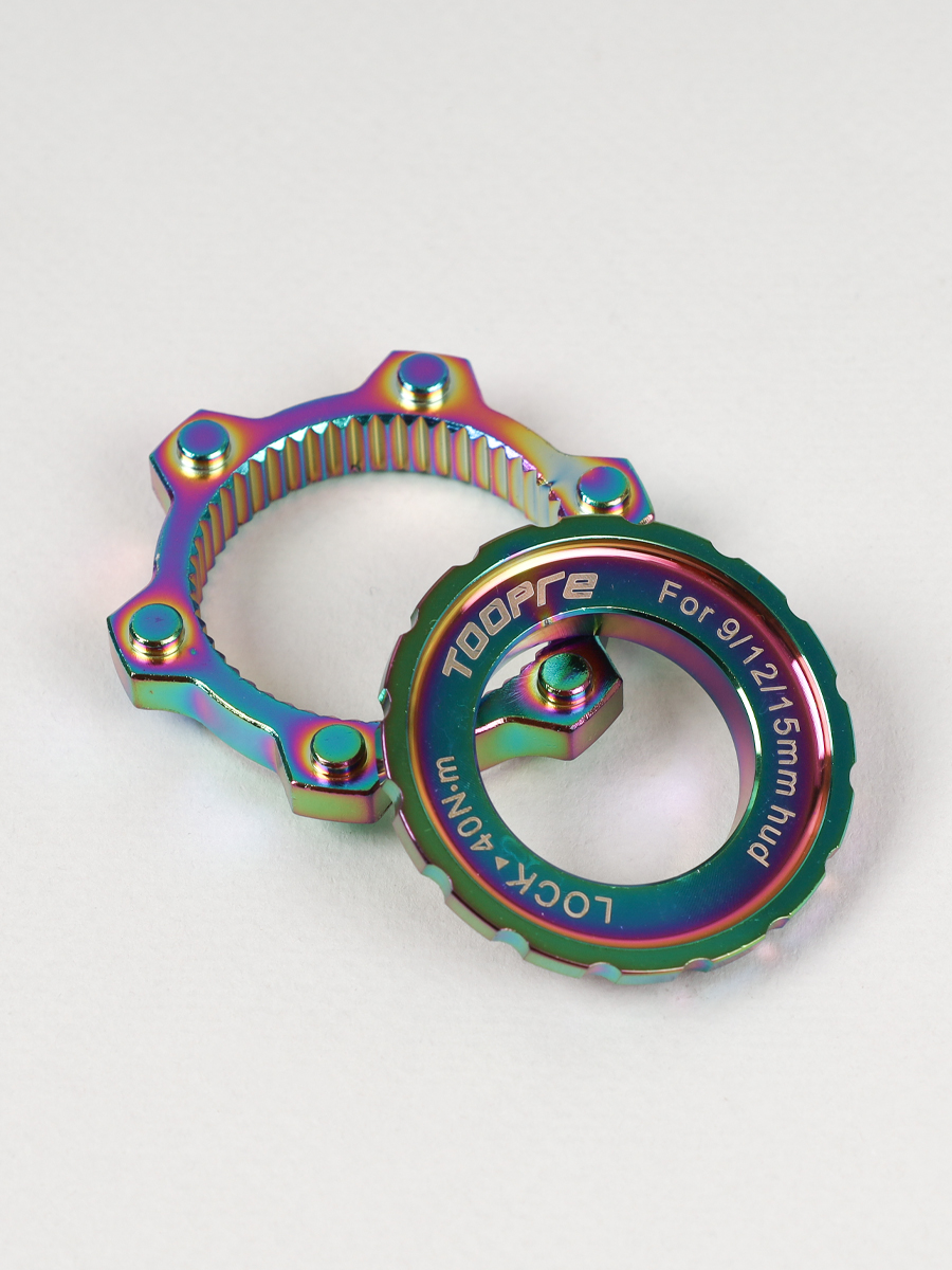 Адаптер тормозного диска (ротора) Six-hole (6 болтов) под крепление втулки Centerlock hub. TOOPRE CLDA-01 Комплект адаптер+ чашка. Цветной