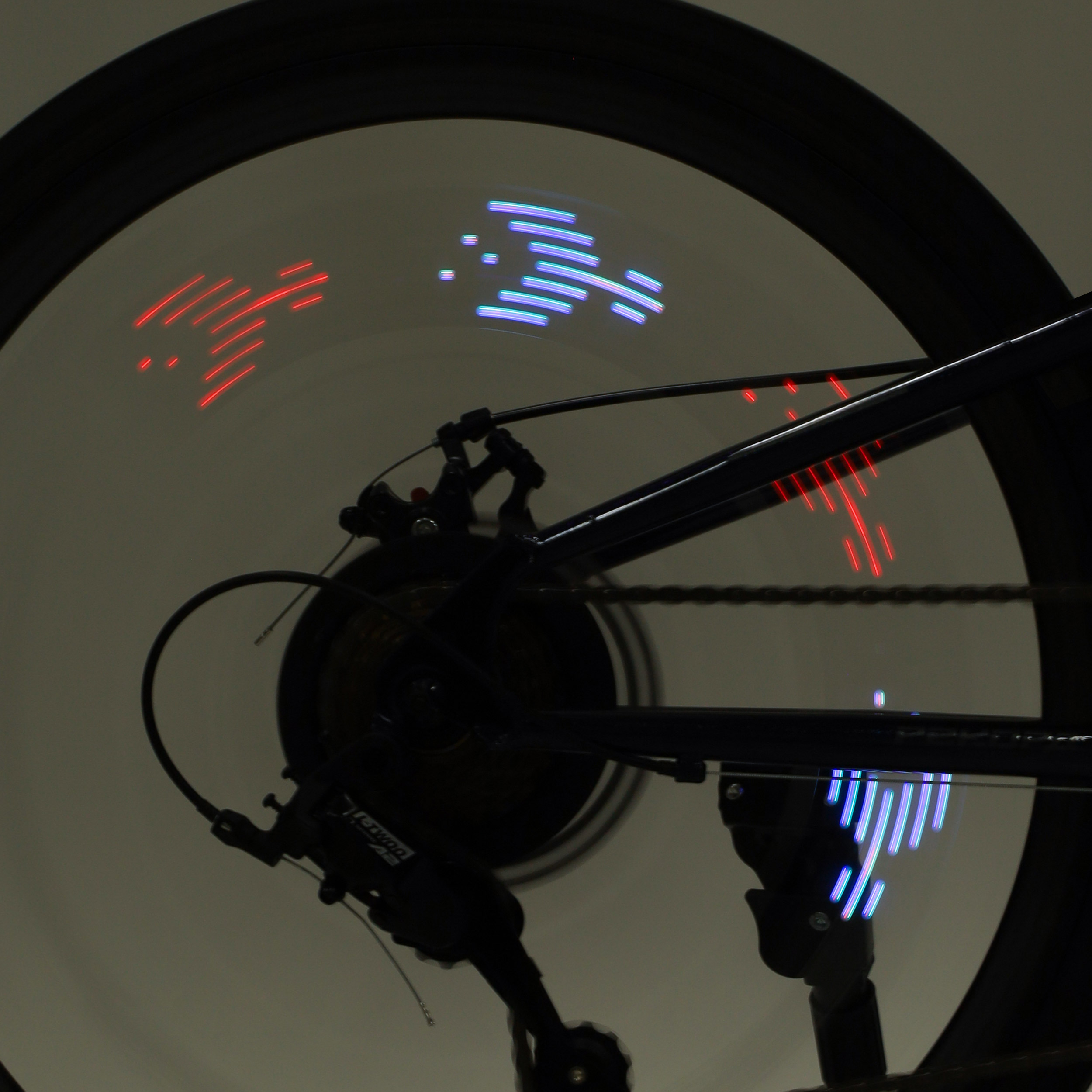 Фонарь подсветка для колес COMIRON "A02" корпус: пластик; свет 14 RGB LED; аккум USB; влагозащита IPX5; 30 рисунков. /уп 100/