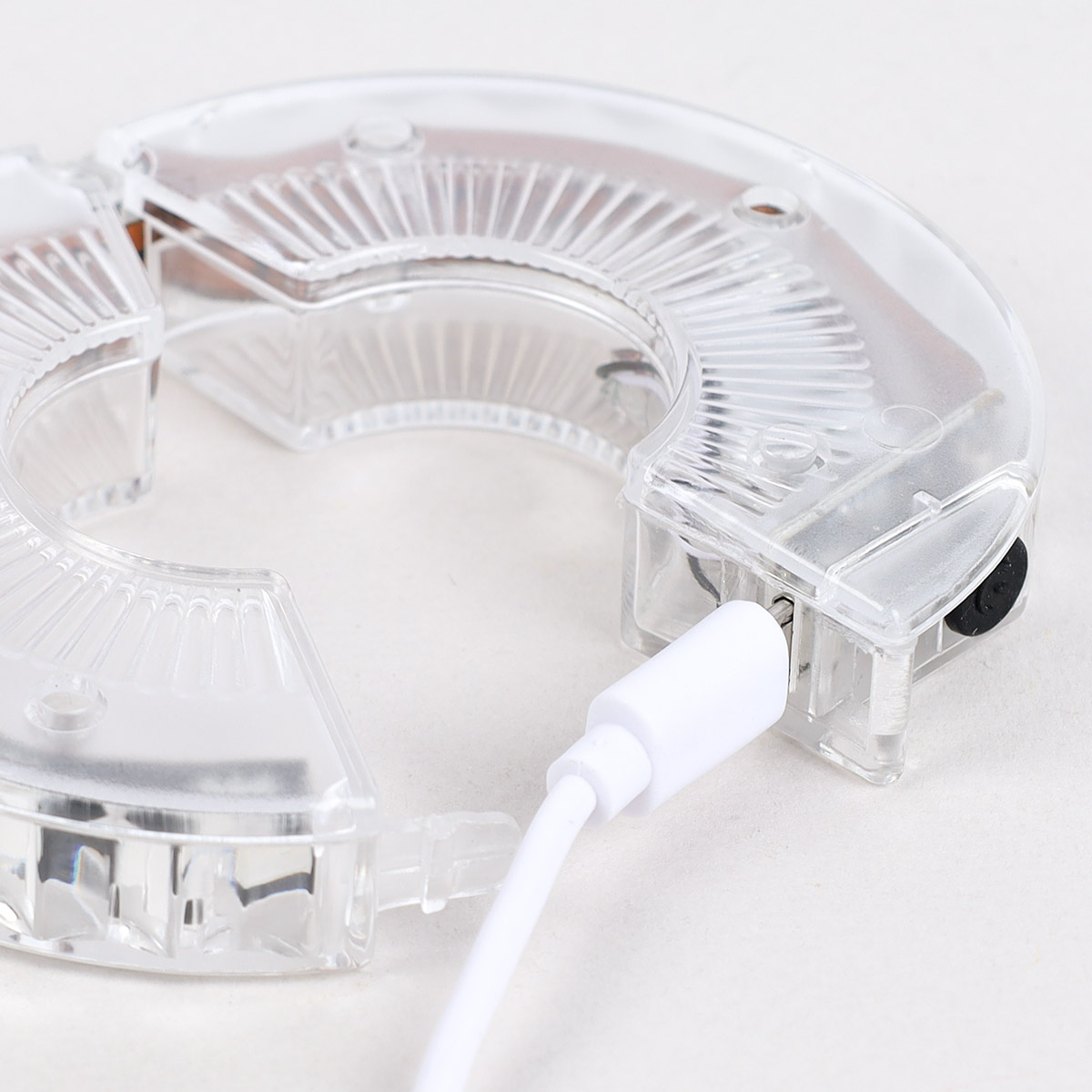 Фонарь интеллектуальный подсветка для колес COMIRON "A13" корпус: пластик; свет 12 RGB LED; аккум 300 mAh USB; влагозащита IPX4; 7 цветов. Вес 40гр. /