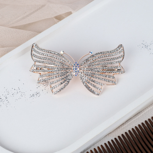 Заколка-автомат Бант золото/стразы / N3258-12 /уп 12/