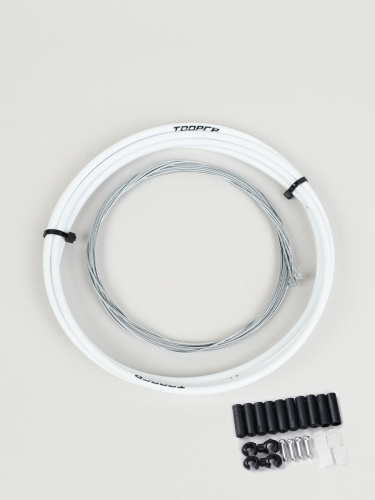 Комплект оплетки и тросов велосипеда на переключение. 1 Оплетка/2 троса/наконечники/зажимы. TOOPRE SCS-001. белый /уп 100/