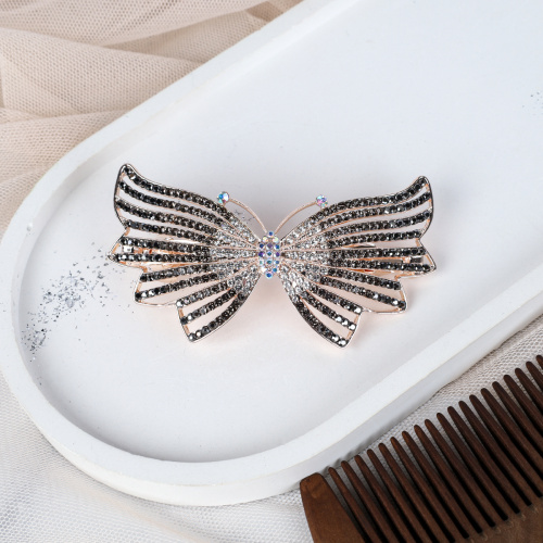 Заколка-автомат Бант золото/стразы / N3258-12 /уп 12/